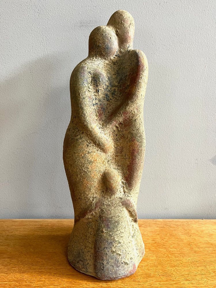 Coursely patinated terracotta sculpture of a man/woman and child 1970s