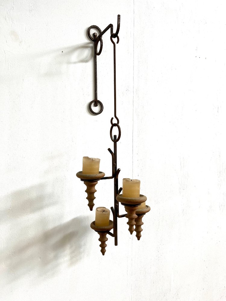 Brutalist wrought iron wall hanger with stoneware candle holders by Tromberg Denmark 1960s